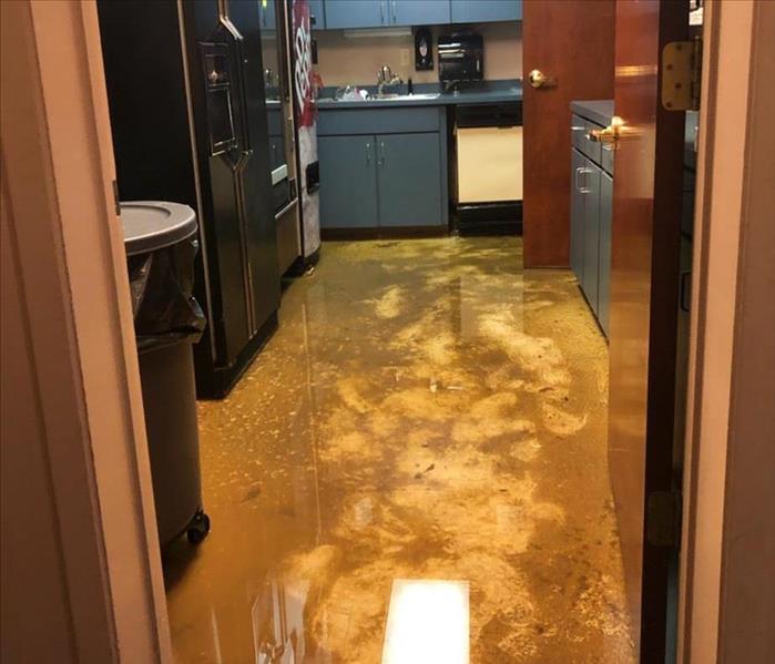 A flooded office break room 