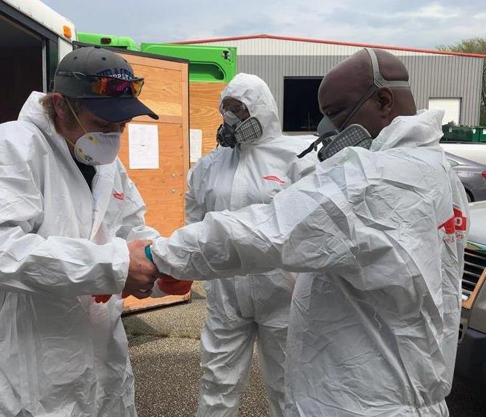SERVPRO crew members suited up in PPE
