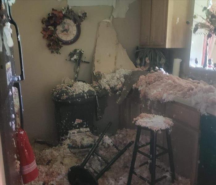 damage in a apartment kitchen after a fire