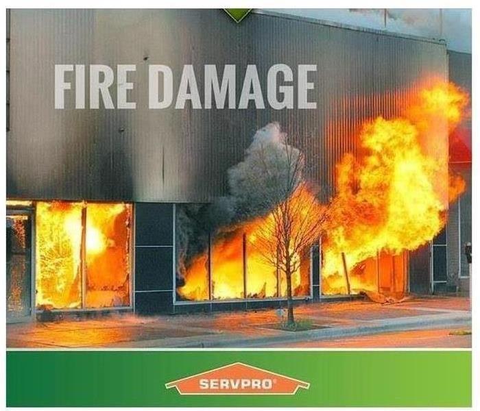 Burning building with Servpro logo